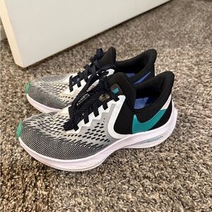 Nike Running Shoes with Teal Swoosh
